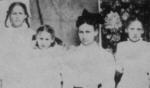 Click on image to
enlarge Mother and 3 small girls